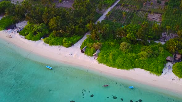 Drone view tourism of island beach by blue sea with sand background