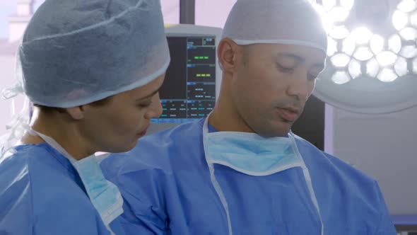 Medical professionals working at a hospital alt