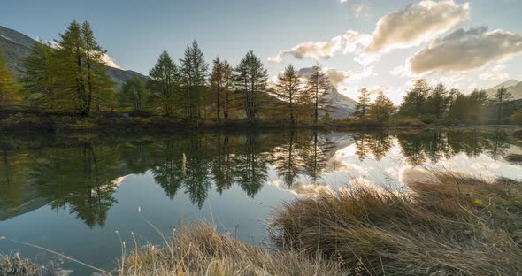 Timelapse View of Perfect Reflection of Matterhorn Peak in Stunning Mountain Lake. Aerial Shot of