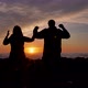 Slow Motion Couple Hands Up Then Run Together with Sunlight in Background - VideoHive Item for Sale