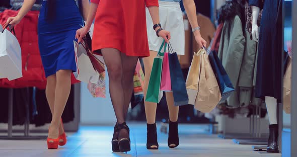 Shopaholic Female Legs with Shopping Bags