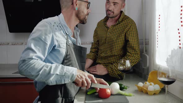 Happy Hipster Gay Couple in Love Standing in the Kitchen