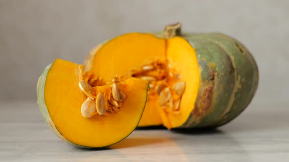 Freshly Cut Slice of Pumpkin on the Table