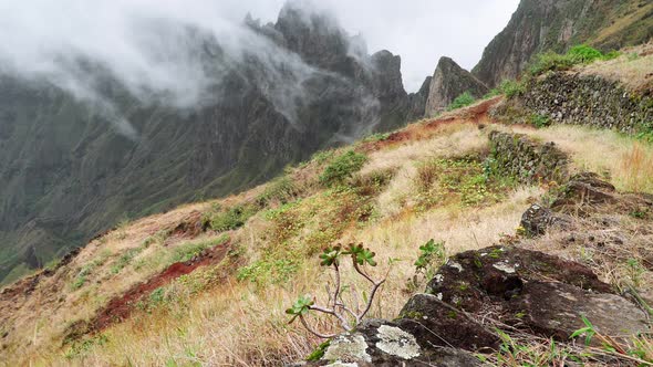 Fog Flowing Over Their Edges of Mountain Peaks. Amazing Mountain Scenery in Xo-Xo Valley. Santo