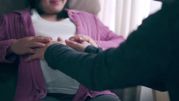 Pregnant Couple Feels Love and Relax at Home