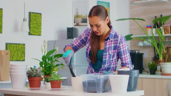 Putting Soil in Flowerpot