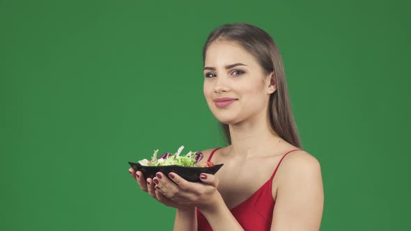Gorgeous Happy Healthy Woman Smelling Delicious Salad Smiling Joyfully