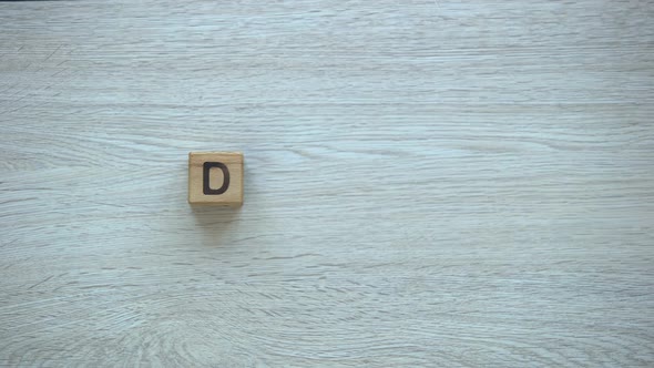 Dream, Stop Motion Word on Wooden Cubes, Possibilities, Motivation and Goals