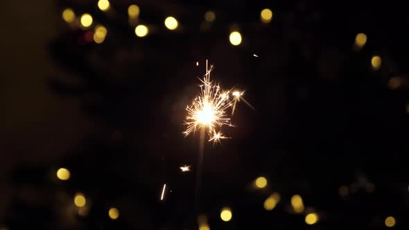 Sparkler Lights on the Background of a Blurred Lighting alt