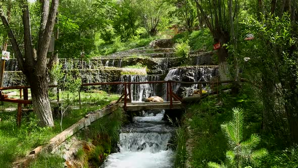 Waterfall With Bridge