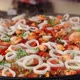 Chef Cooking Paella Rice Dish In Big Wok - VideoHive Item for Sale