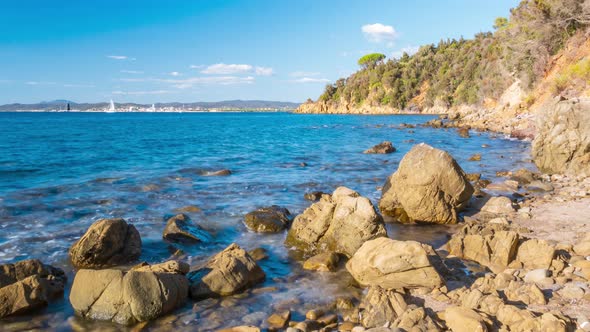 Time lapse: empty beach at Cala Violina, Tuscany, Italy. Rocky bay in natural park