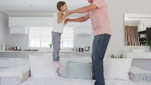 Grandfather and granddaughter spending time together