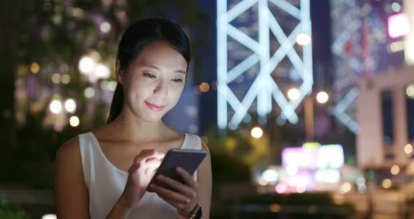 Woman Use of Mobile Phone for Online