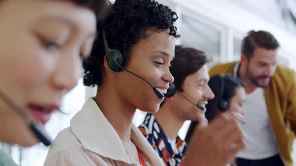 Call centre staff working in a modern office