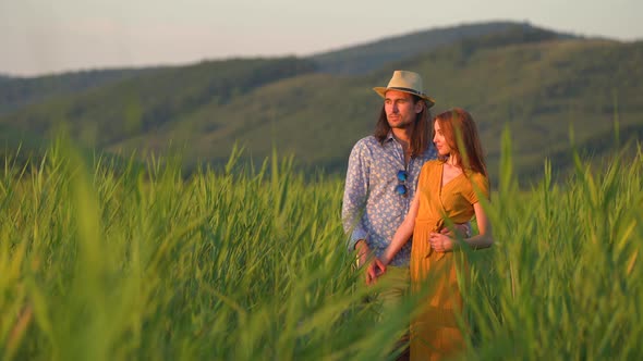 Couple in a reed field