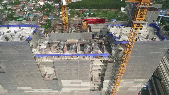 Aerial view of modern high rise building under construction in the busy city centre business distric