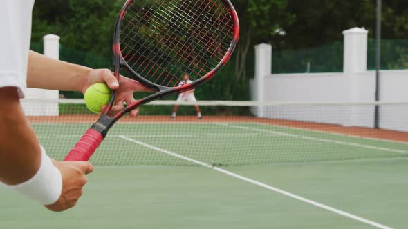 Tennis player doing a service