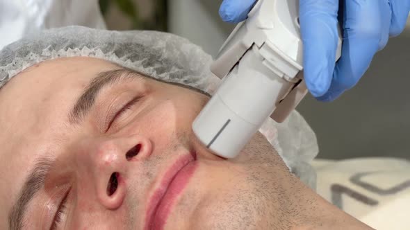 Man Getting Ultrasound Skin Treatment at Beauty Clinic