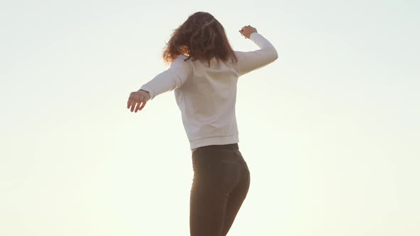 Cheerful Girl Enjoying the Day Outdoor.