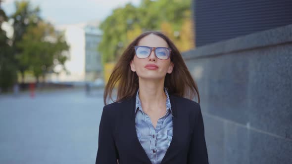 Businesswoman Walking City Street Looking at Camera and Smile Caucasian Female Business Person Walk