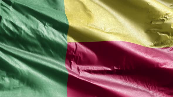Benin textile flag waving on the wind. Slow motion. 20 seconds loop.