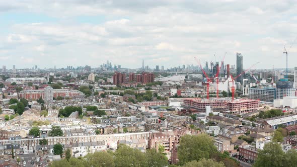 Descending drone shot of central London skyline from west