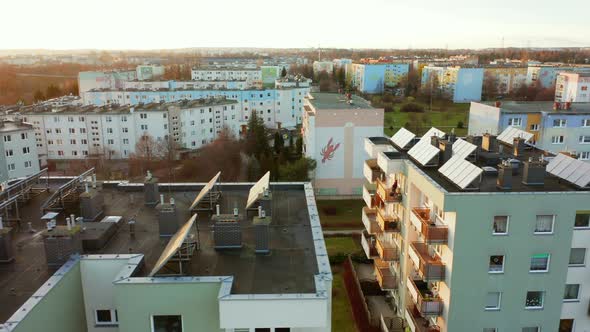 Drone Shot on Modern Multiapartment Buildings with Solar Panels on the Roofs