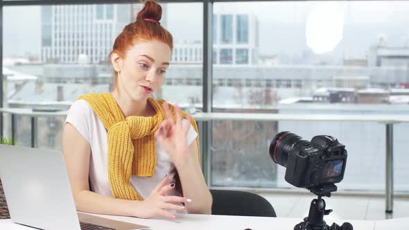 Girl Beauty Blogger Records Training Video Course on Digital Camera