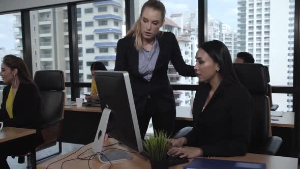 Young Leader Gives Advice to Young Woman Worker