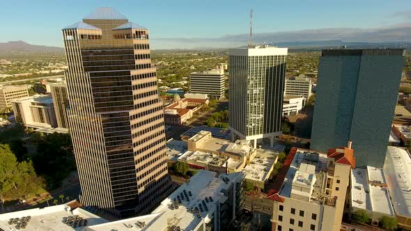 Cinematic drone shot of downtown Tucson Arizona, rising and tilting downward