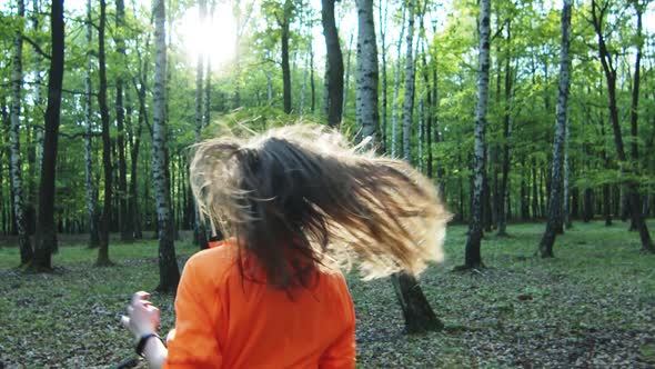 Slow Motion Girl Running in Birch Forest