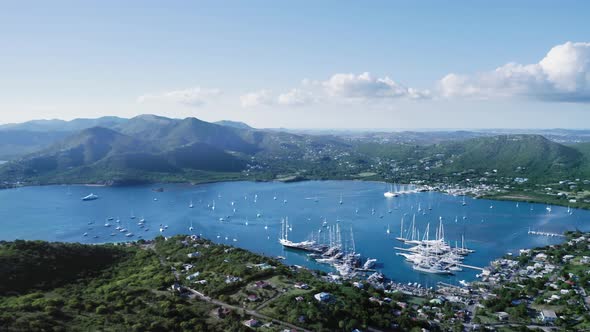 Aerial view of the sea bay with yachts near the town in Falmouth Harbour, Antigua and Barbuda