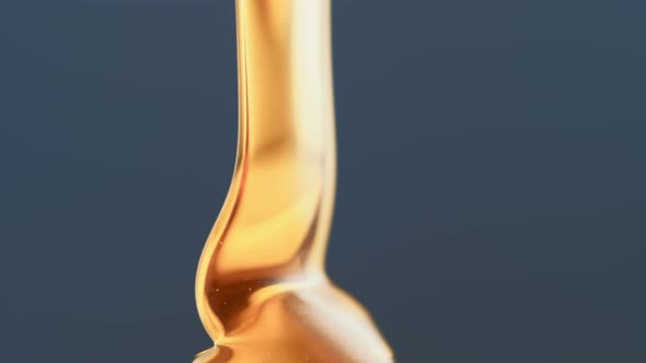 Thick honey dripping. Slow Motion. alt