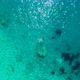 Girl Swimming in Mediterranean Sea Drone View From the Top - VideoHive Item for Sale