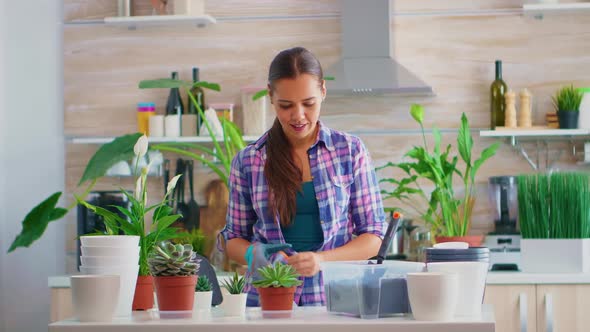 Woman House Gardening in Kitchen