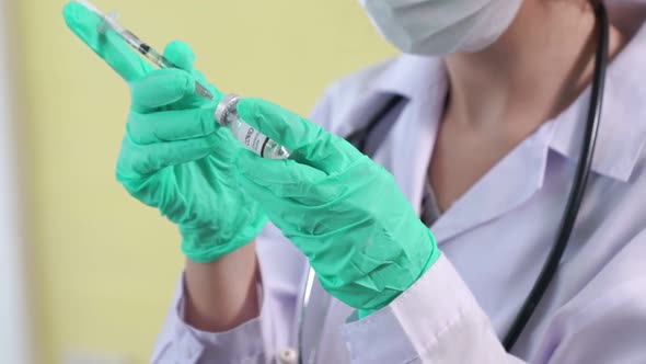 Skillful Doctor Prepare Vaccine Proficiently Before Injection