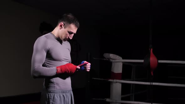 The Boxer Uses the Phone in the Gym