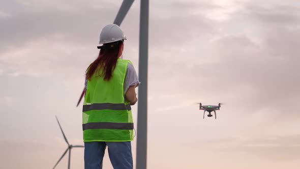 Woman Holding Joystick Controlling Flying Drone Check Correct Operation Windmill