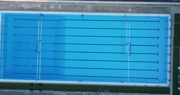 Empty swimming pool for playing water polo. Top down view