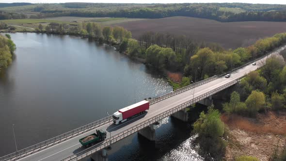 Transport and Cars Go Along the Highway. Roads Bridges and Traffic Jams. Logistics Enterprises.