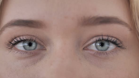 Blinking Eyes Of Young Woman