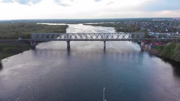 Drone Shooting of a Panorama of a Part of the City and View of Double Road and Railway Bridges