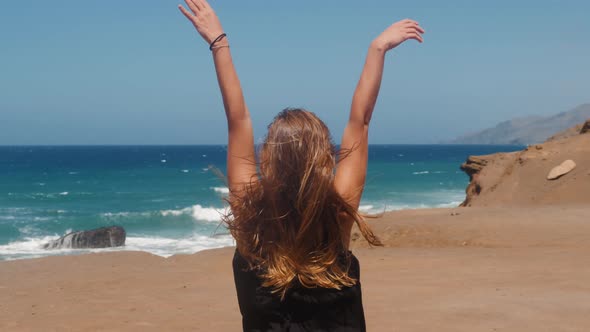 Young Sporty Tourist Woman Jogging Near the Ocean