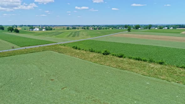 Aerial View of the Farm Countryside with Planted Fields and Pastures