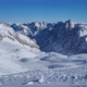 Panorama of ski resort in the german alps. Skiers on a slope on a sunny winter day. - VideoHive Item for Sale