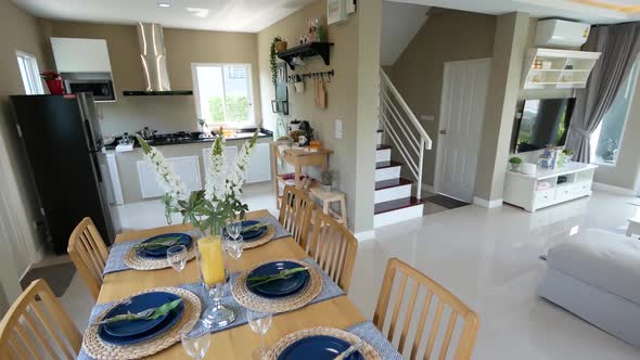 Modern Open Plan Home Living Area Connected With Dining and Kitchen Area