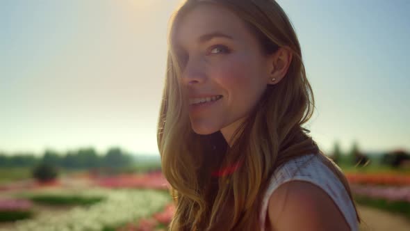 Portrait of Smiling Woman in Sunlight