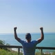 Tourist Raises Hands with Happiness - VideoHive Item for Sale