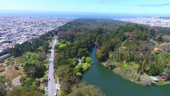Aerial Pan Across San Francisco Golden Gate Park with City and Ocean Around